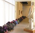 School group visit.  Mr Gladstone watches over the student's bags  (Image: M. Cook)